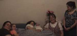 Terri and baby Esther, surrounded by our dedicated support team of labor assistants